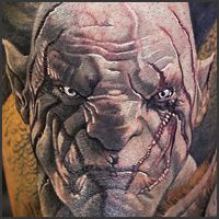 Татуировка с изображением Азога и Смауга